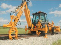 Backhoe Loader - Attachment Systems